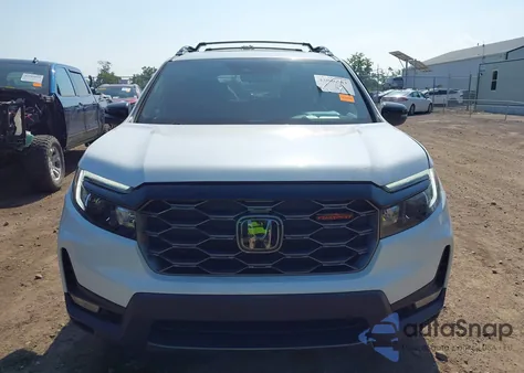 2022 Honda Passport Awd Trailsport z USA, uszkodzony, nr VIN 5FNYF8H63NB008028